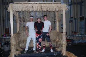 Schuler, Flynn and MacLain are proud of their newly built tiki hut. Photo by: Elizabeth Jackson