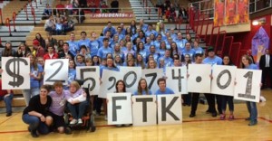 After the half time dance of the varsity basketball game, the participants of the 3rd annual Riley's Dance Marathon shared their joy of raising over $25,000 for the kids. Photo by: Katie Sommers