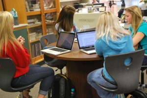 Taking Mrs. Gifford's words of advice, some of the new journalism students are realizing the areas they need to improve. Photo by: Elizabeth Jackson