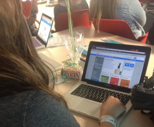 Sophomore Anya Hettich sees how to increase her PSAT scores and prepare for the SAT. Photo by: Bre Martin