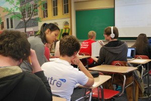 Guan Lao Shi, our Chinese teacher, answering a student's question about the study guide for their chapter test. Photo by: Daisy Lewis