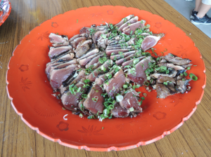 These are smoked fishes with soy souse and welsh onion. Photo by: Mai Takeuchi