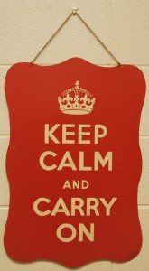 The common motto, "KEEP CALM AND CARRY ON," hangs in Mrs. Gifford's room. Mrs. Gifford said, "No matter what happens, we need to keep calm and carry on." Photo by: Emory Smith