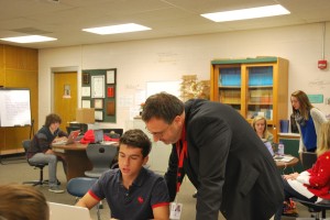 Mr.Olson working with exchange student Leon Olszewski 