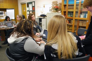 Hard at work Editor Eric Burch helps with editing pictures for the Pilgrim Perspective. Photo by: Janessa Salazar