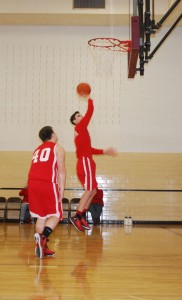 Basketball player Tommy Holloway practicing shooting while being guarded by Jarred Hurford. Photo By: Janessa Salazar  