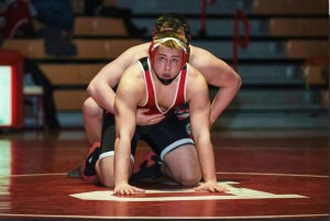 Wrestler Chaz Scruggs getting ready to start the next round against Concord. Photo Contributed by: Rockies Wrestling