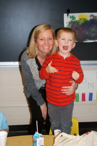 Mrs. McNeil and her oldest son Harrison enjoying their Valentine's Day celebration before their group activity. Photo By: Janessa Salazar 