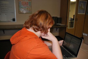 Junior Molly Spencer spends much of her free time at home on her computer, browsing through a number of different social media websites.