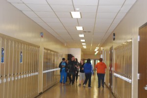 Students congregate with friends during their lunch hour to focus on less stressful activities.  Photo By: Emma Daniels